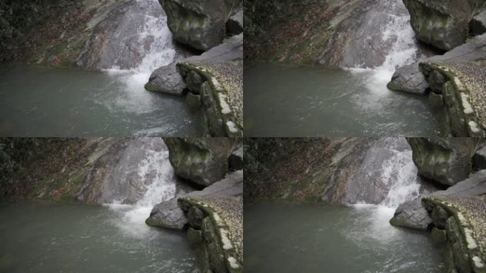 山里石缝中的小溪泉水河流山涧
