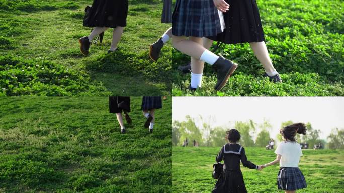 两个女孩行走奔跑在绿草地上