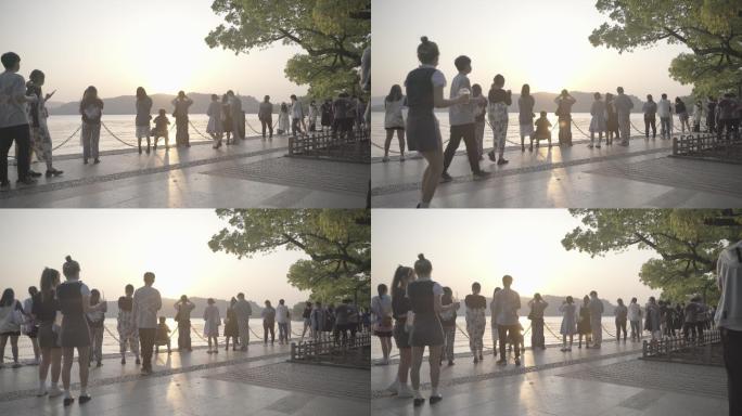 Slog2城市游客拍摄夕阳围观4K素材