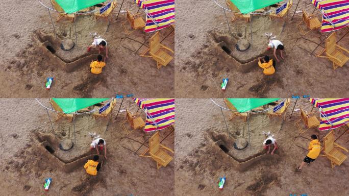 俯拍小孩玩沙子