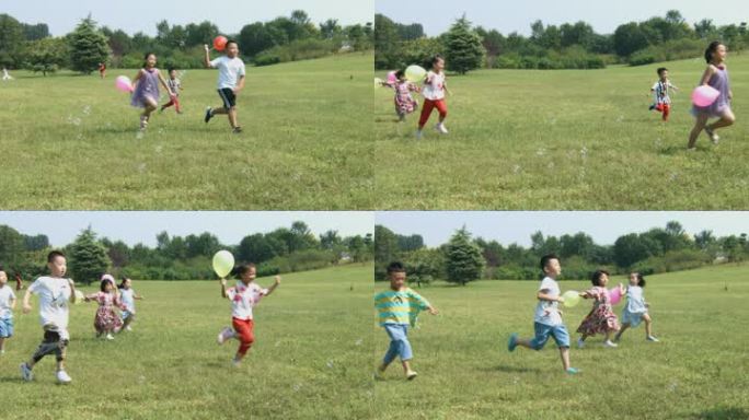 小朋友小孩子拿着气球开心的奔跑