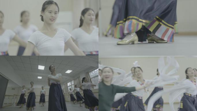女大学生与老师排练民族舞