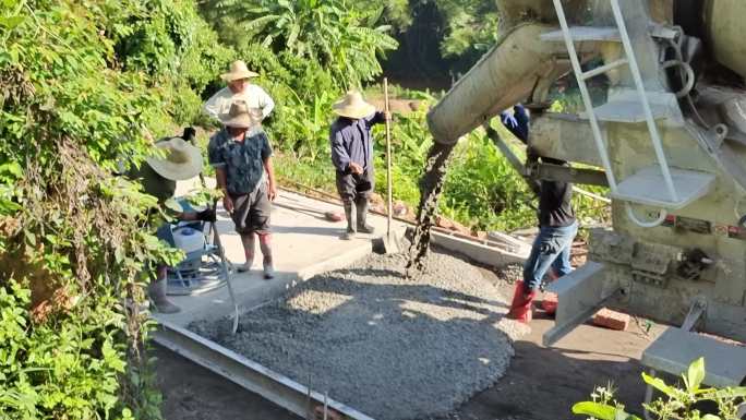 农村农民铺路修路过程集资铺设道路精确扶贫