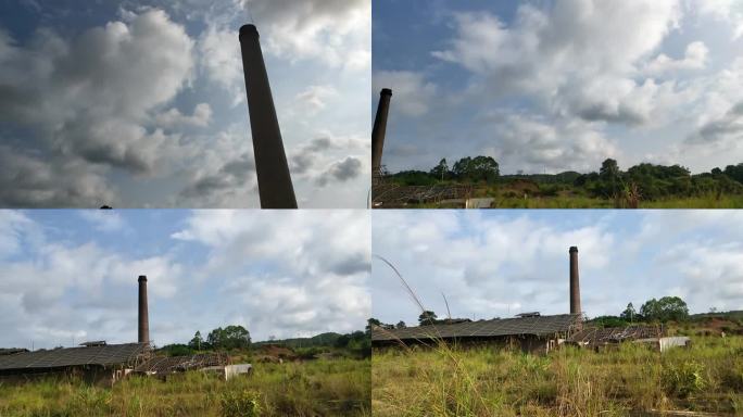 停产荒废的厂房厂区郊外荒野工厂高高的烟囱