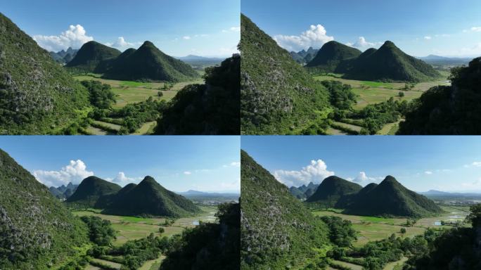 蓝天白云下桂林喀斯特地貌峰林间的田园风光