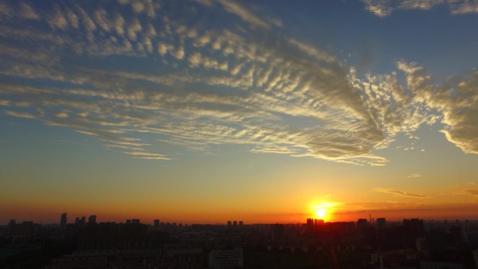 城市日出清晨日出东方太阳升起日出城市朝阳