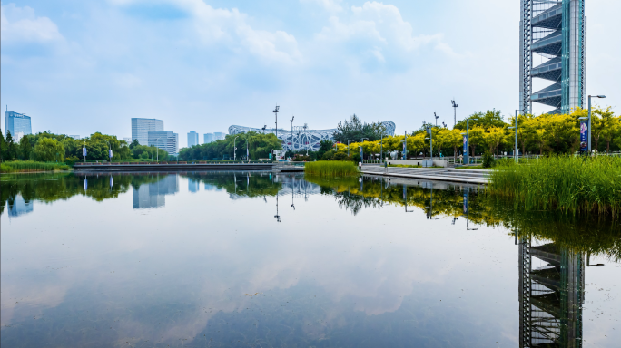 4K城市地标北京鸟巢建筑湖面倒影延时素材