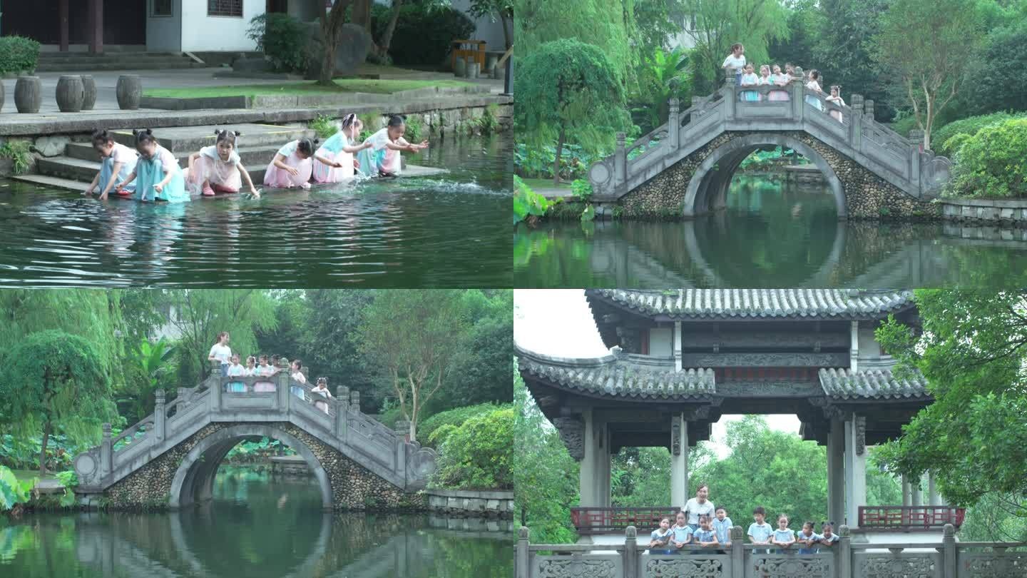 江南汉服小朋友古建筑古装石拱桥水边玩水