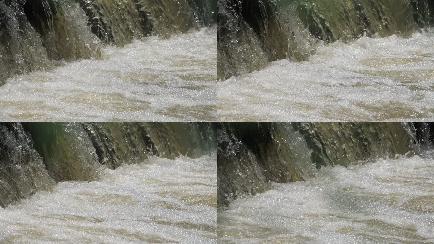 河中湍急的流水和瀑布