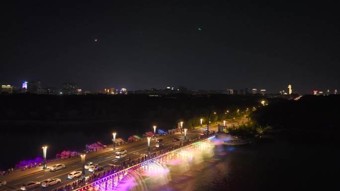 航拍长春市南湖大桥夜景音乐喷泉