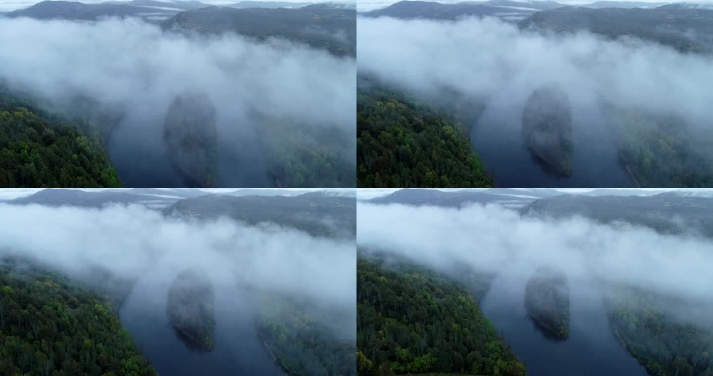 航拍下雨时山林河湾云雾