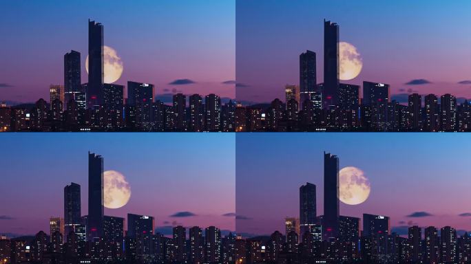 城市夜晚月亮慢慢升起月色