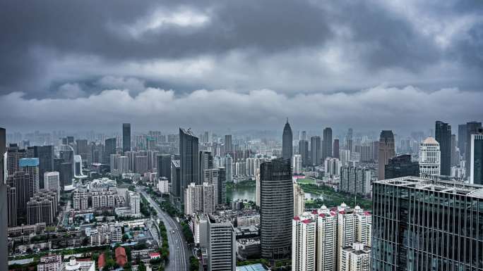 武汉城市建筑高楼大厦下雨前天亮云雾延时