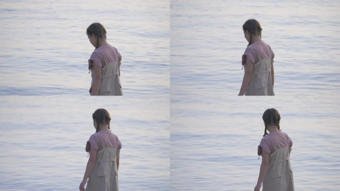 海边独自行走的女人升格慢动作视频