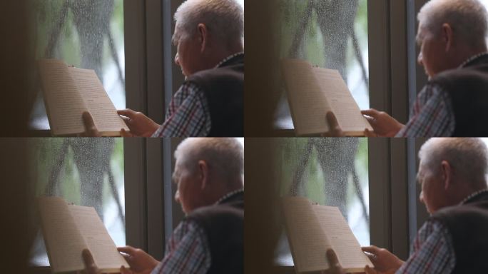 雨天书房书屋书店白发老人看书学习玻璃窗户
