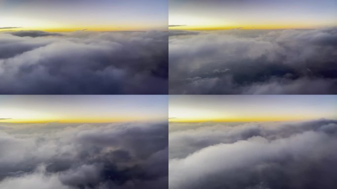 云层之上飞机舷窗外的傍晚自然风光
