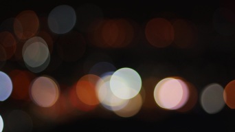 城市闪烁的灯光，用焦外光斑的效果拍摄视频素材