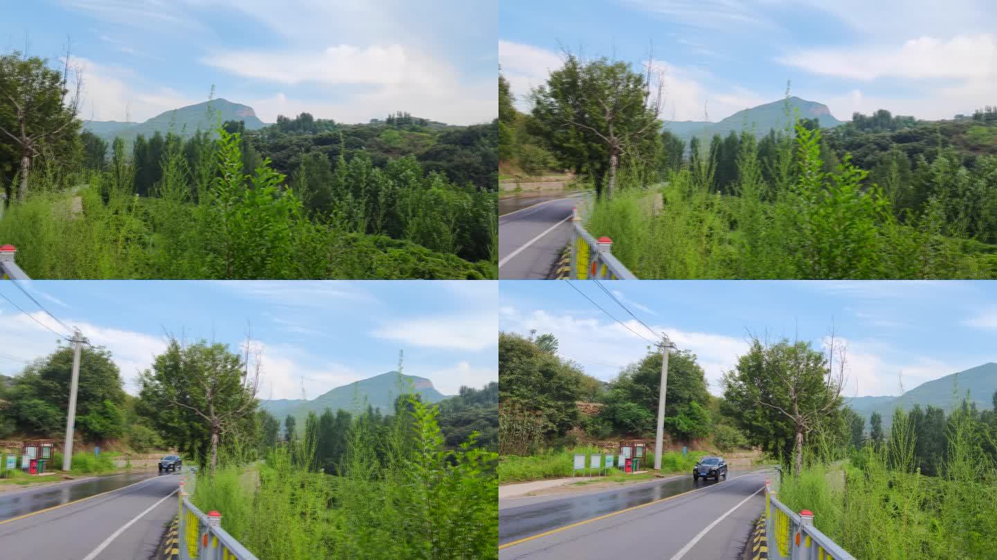 青山蓝天山区景色汽车行驶在山路上山路