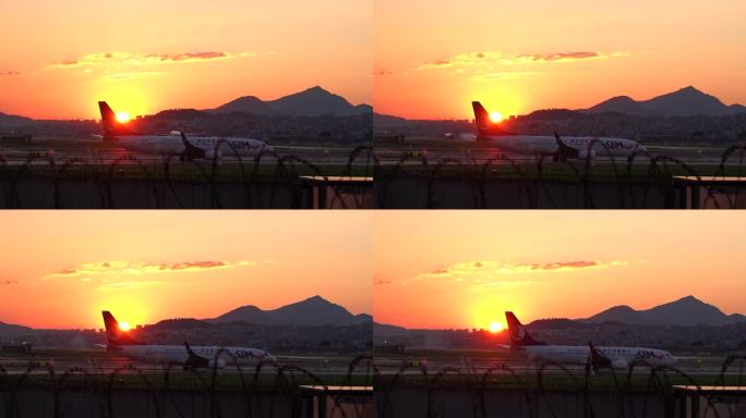 清晨飞机降落在机场跑道