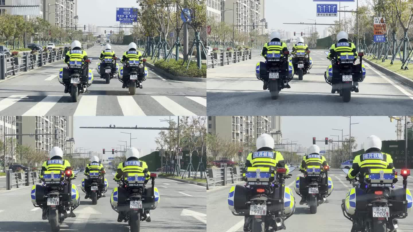 交警驾驶警用摩托在城市道路上巡逻