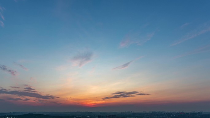 城市日出朝阳朝霞霞光城市天亮大范围延时