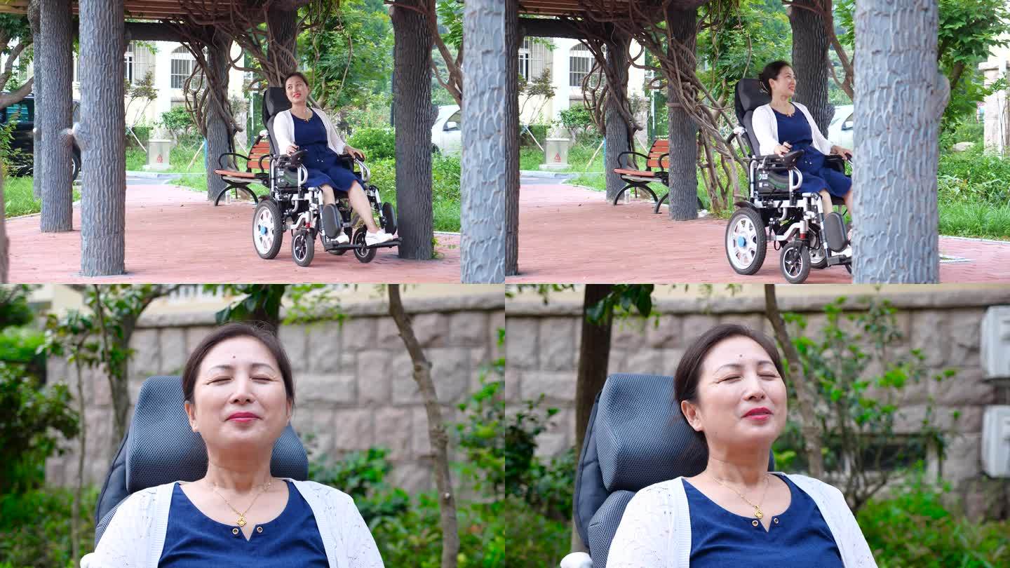 老人坐轮椅去公园呼吸新鲜空气