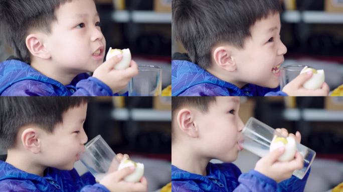 小男孩吃鸡蛋喝牛奶-唯美升格慢镜头