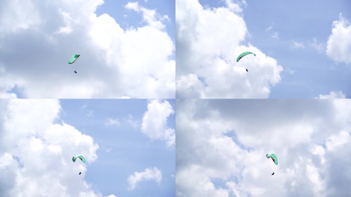 蓝天白云间的滑翔伞
