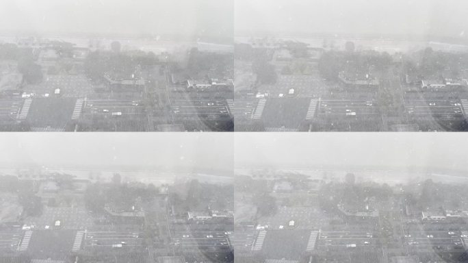 下雪天俯拍杭州滨江闻涛路