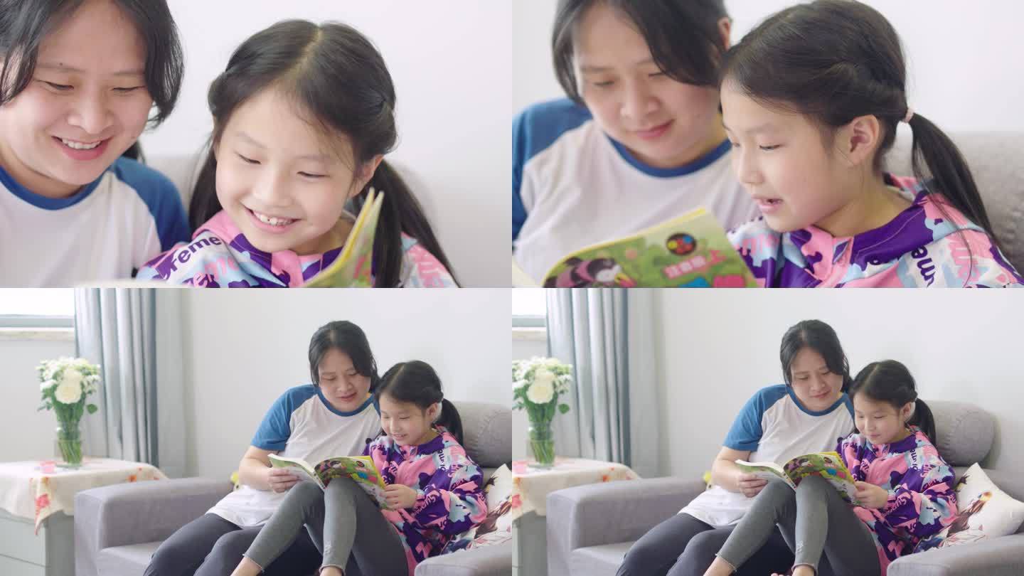 亲子温馨-成长陪伴-妈妈陪小女孩看书