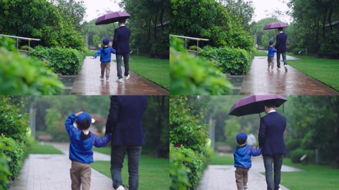 温馨父爱-牵手前向走-雨天打伞背影
