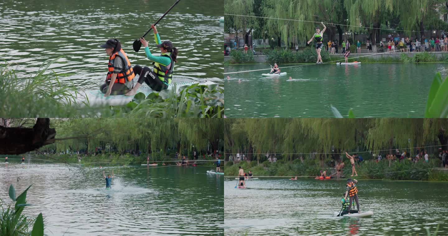 北京夏天在河里游泳划船的人