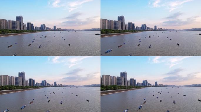 船舶穿梭杭州钱塘江和钱江新城夕阳下航拍
