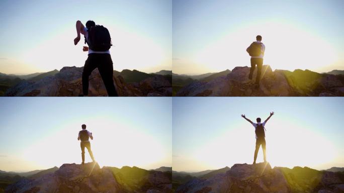 登上山顶 张开双臂 登山  男人背影