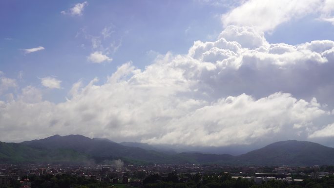 小镇雨后天空夏天乡村气息蓝天白云积雨云层