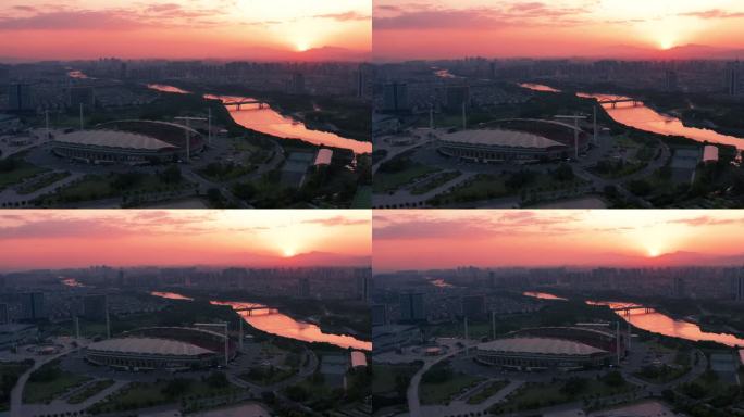 4K航拍 义乌市体育场城市晚霞风光