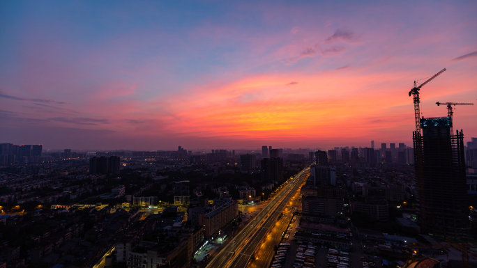 城市天亮地平线日出朝霞朝阳光影变幻延时