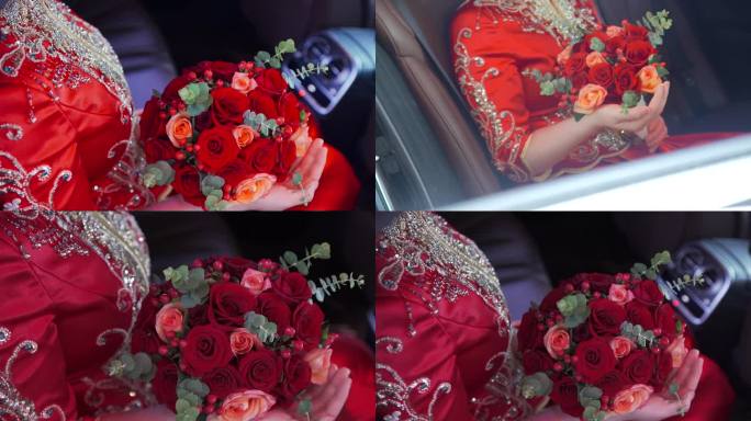 新娘手里的红色玫瑰手捧花