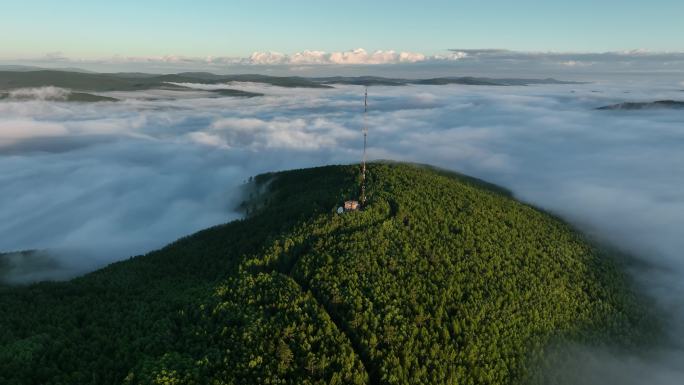 航拍山川云海和山巅通信塔