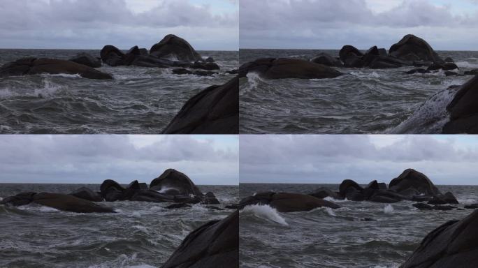 海浪浪花飞溅拍打礁石波涛汹涌