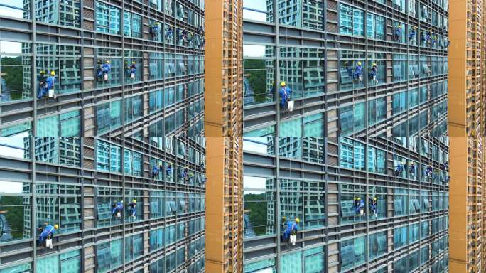 高空作业大楼玻璃清洗擦玻璃工人城市清洁工
