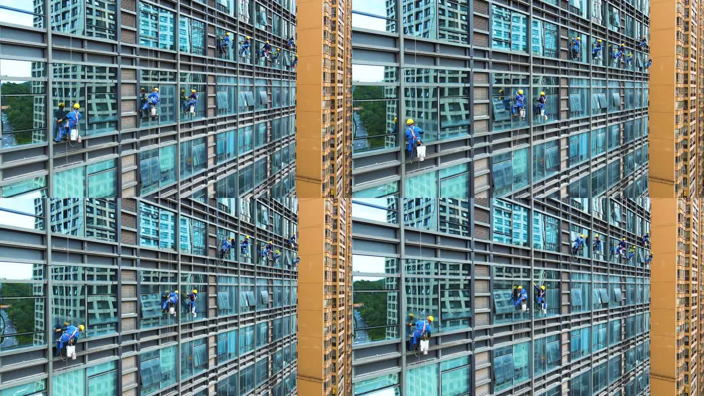 高空作业大楼玻璃清洗擦玻璃工人城市清洁工
