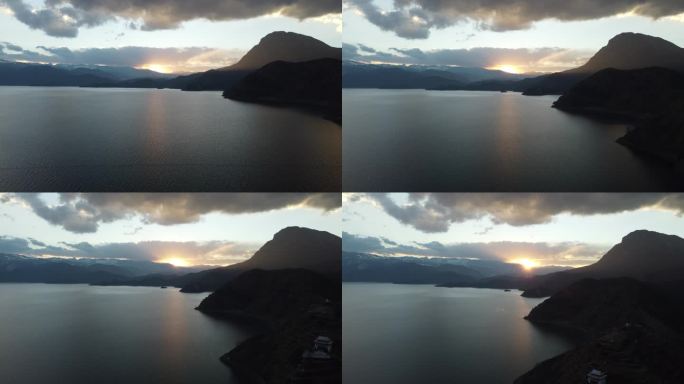 4K航拍湖畔岛屿阳光穿过云层