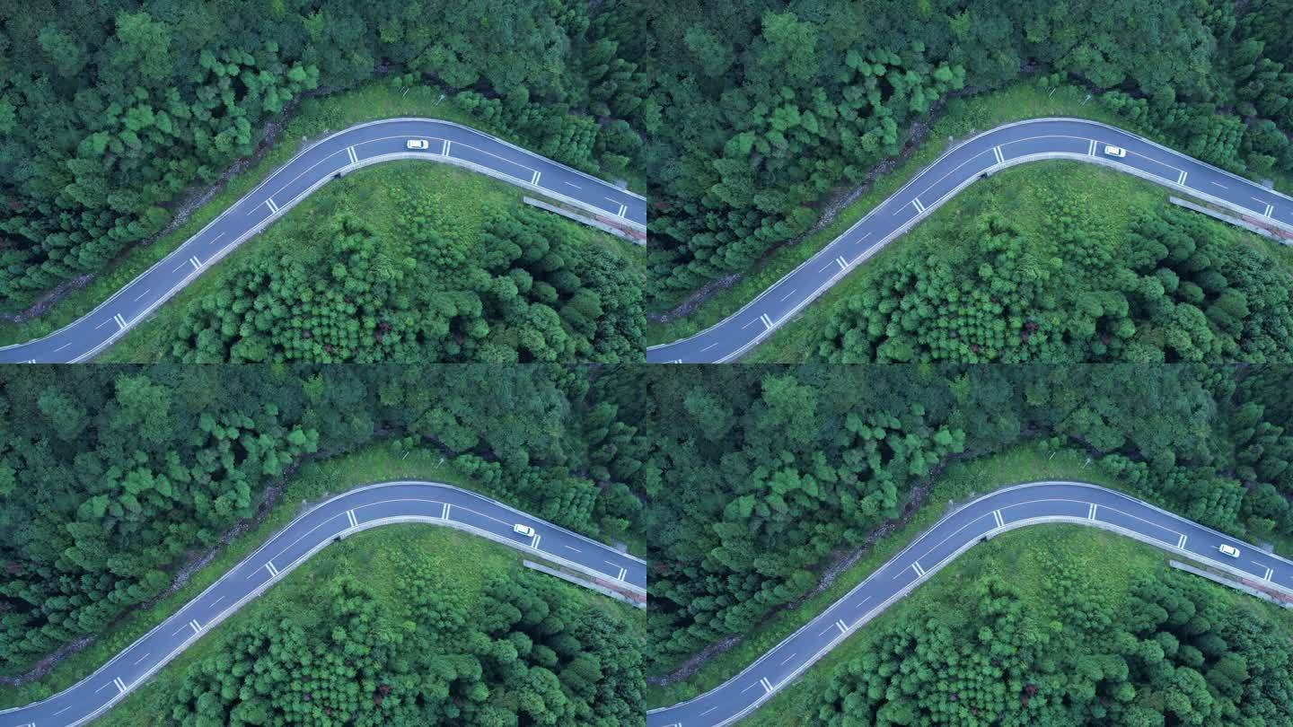 俯视山林蜿蜒公路白色行车2