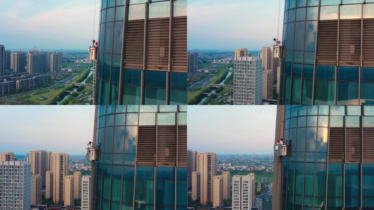 蜘蛛人工人在摩天大楼清洁作业