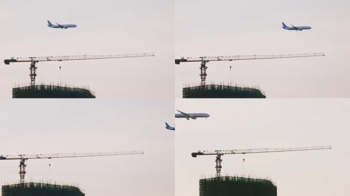 飞机飞过正在建设的大楼