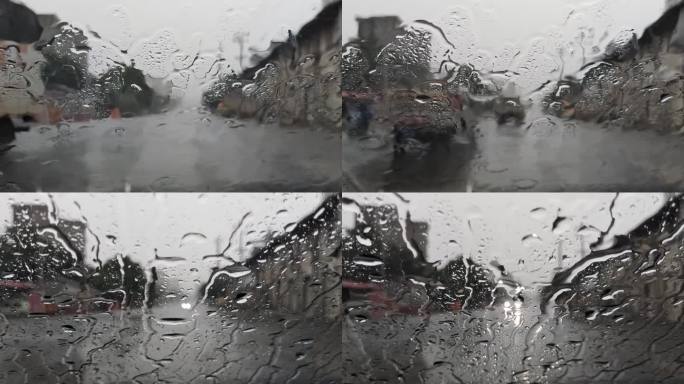 雨水打在车窗玻璃上雨滴雨滴落 雨滴玻璃
