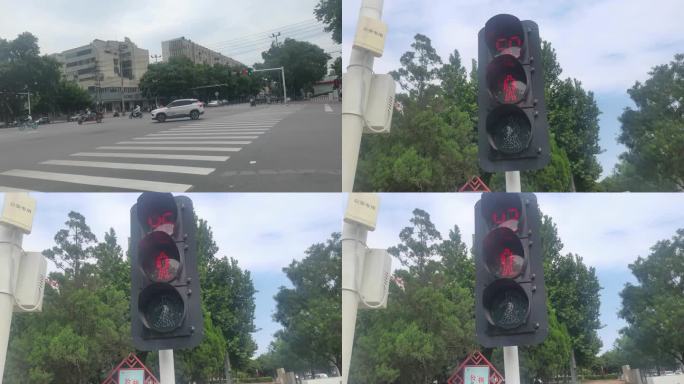 实拍十字路口车辆通行红绿灯