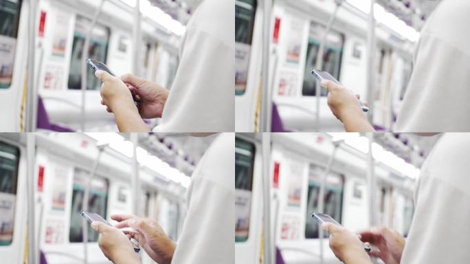 地铁上用手机玩手机