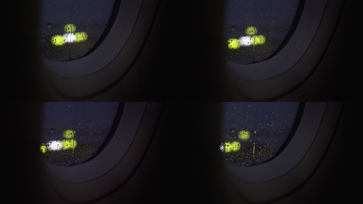 雨滴掉落在飞机窗户上